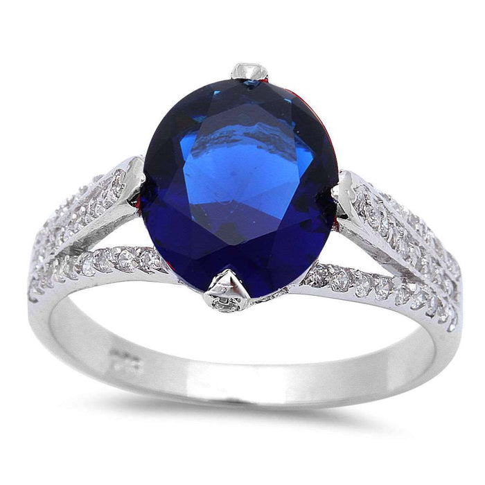 CLOSEOUT!.925 Sterling Silver 4ct Oval Cut Blue Sapphire & Cz Fashion Ring